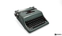 Máquina de escribir Olivetti Studio 44 + estuche de madera bordo