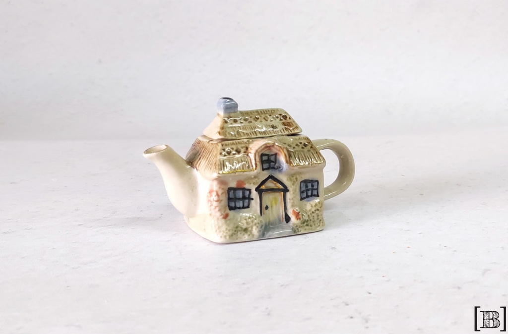 Adorno casita tetera