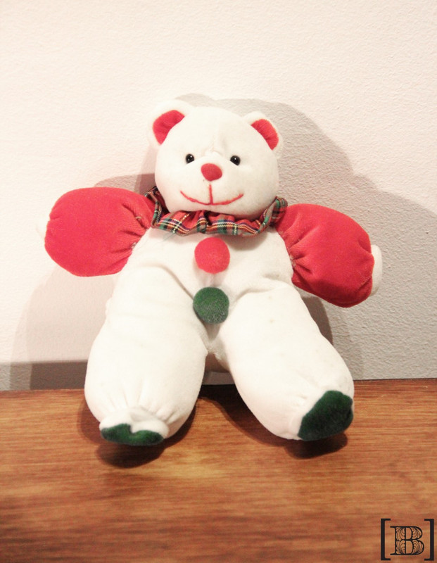 Osito arlequín de peluche